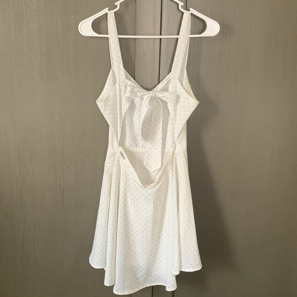 Size small open back mini dress white with blue stars, moons, and flower pattern - Picture 2 of 4